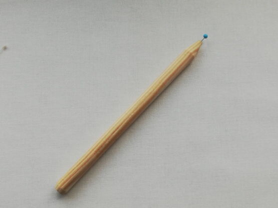 Hölzchen mit Stecknadel